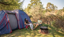 A couple camping at Village campground, Hill End Historic Site. Photo: John Spencer/OEH